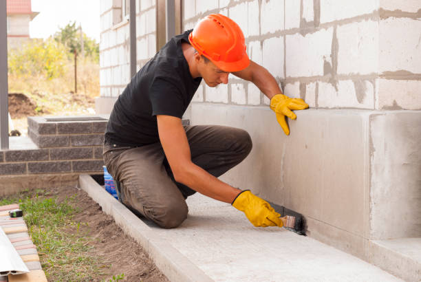 Waterproofing professionals working in Ashley, MI